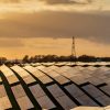 How can GIS help assess the suitability of solar farm sites?